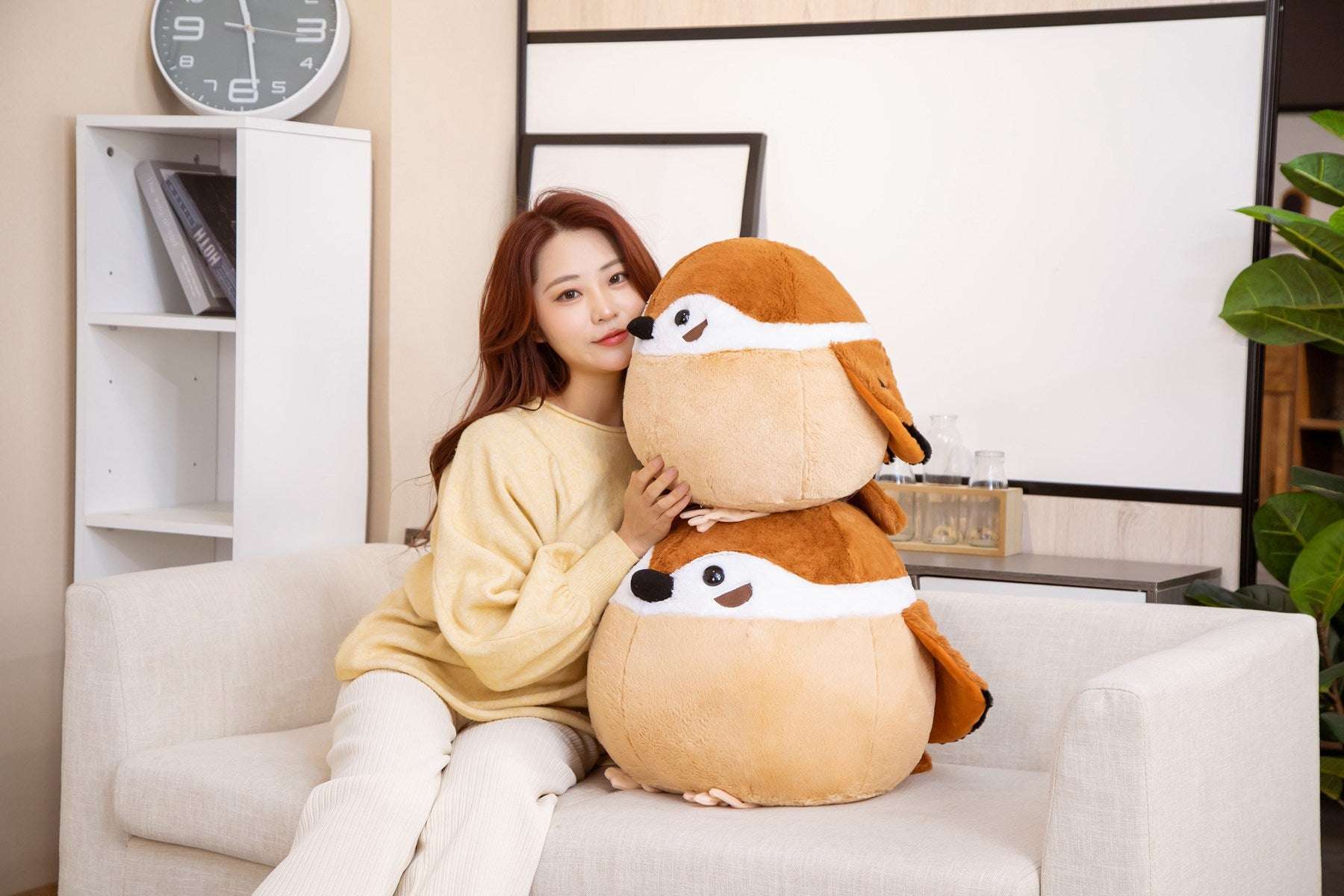 woman holding 2 Chubby Tit Plush Toy