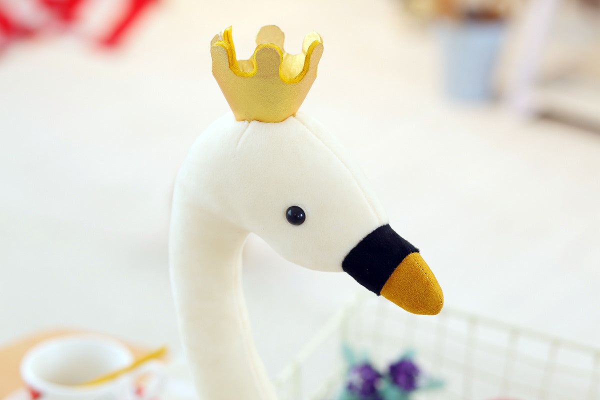 white flamingo plush toy with crown