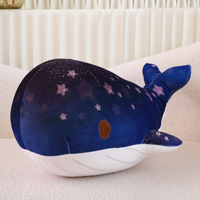 Large blue whale plush pillow with starry sky design