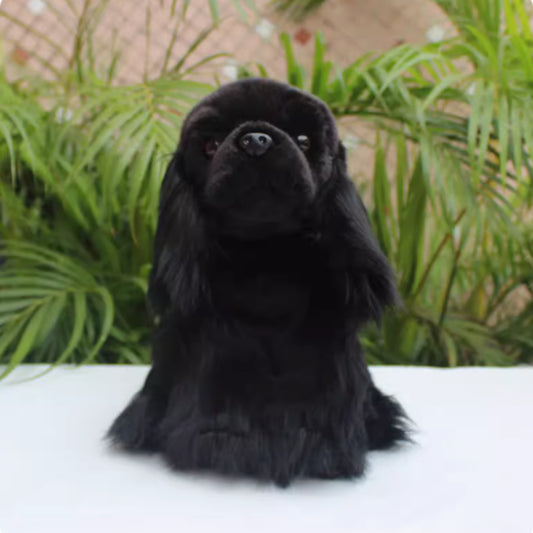 Black plush cuddly dog
