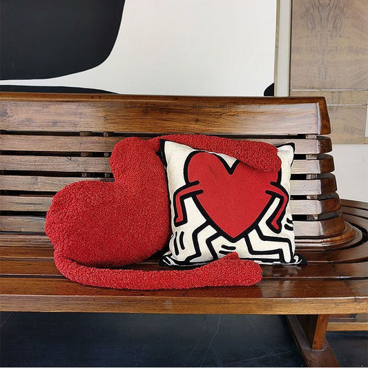 Red heart-shaped cushion for sofa or bed decor
