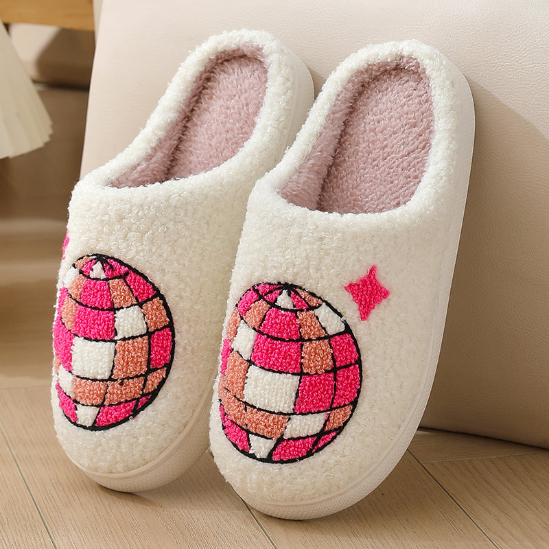 Pair of white slippers with disco ball design