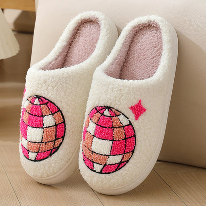 Pair of white slippers with disco ball design