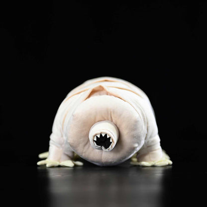 Plush toy tardigrade on a black background
