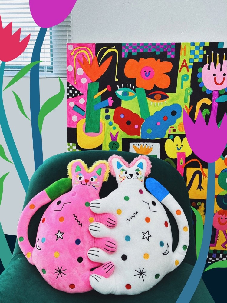 Colourful cat shaped cushions 