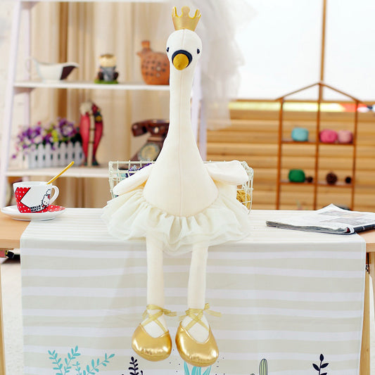 white flamingo plush toy with crown