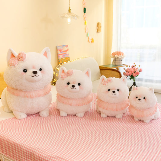 White Pomeranian stuffed animal plush toy with pink ruffle collar in various sizes, cuddly and cute for children or adults.