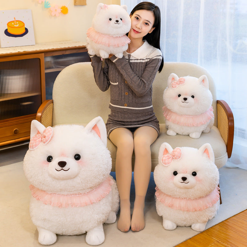 White Pomeranian stuffed animal plush toy with pink ruffle collar in various sizes, cuddly and cute for children or adults.