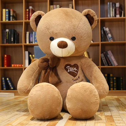 Big teddy bear plush with ribbon-style bow