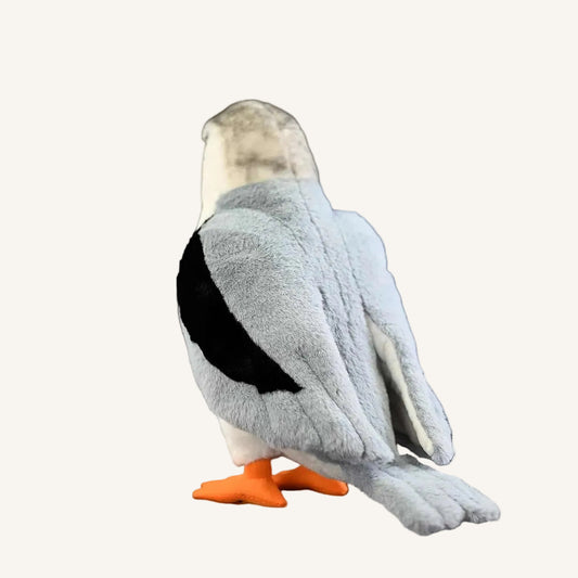 Side view of soft Black-winged Kite bird plush toy