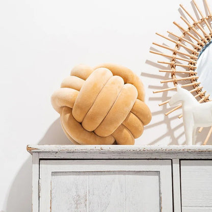 Camel knot cushion