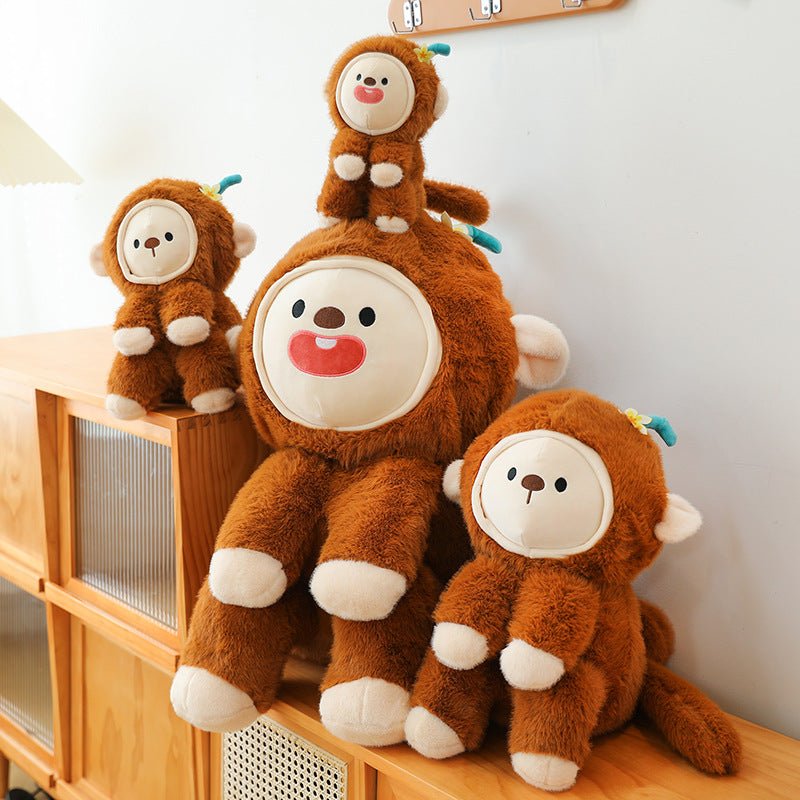 Soft monkey plush showing detachable face design