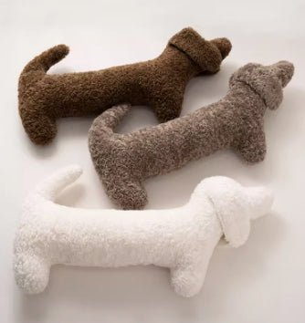 Dachshund throw pillow in a long sausage dog shape