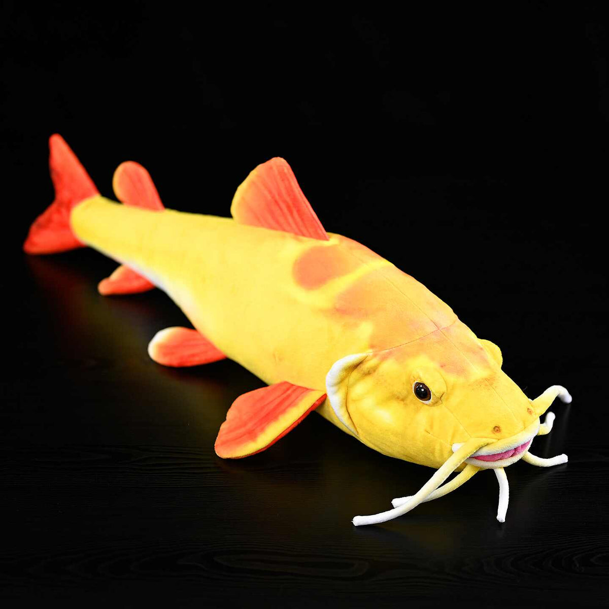 Golden redtail fish plush toy for display or gifting