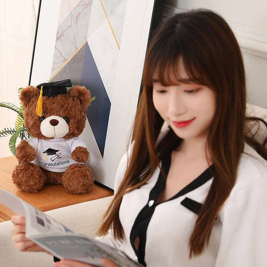 Graduation bear plush wearing a graduation-style cap