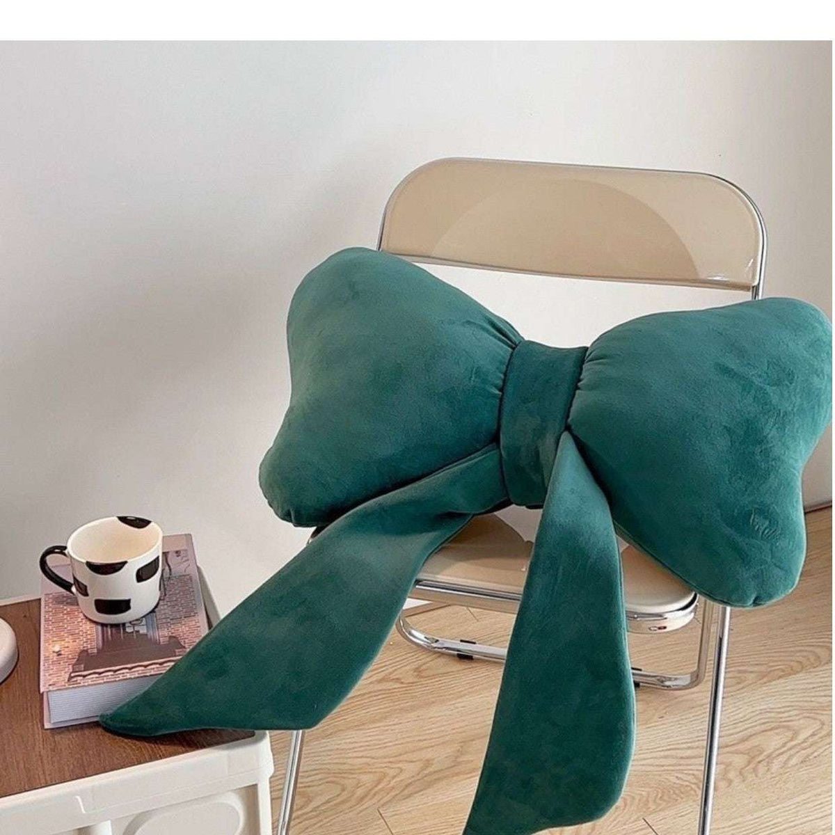 Green large bow cushion 70x40cm