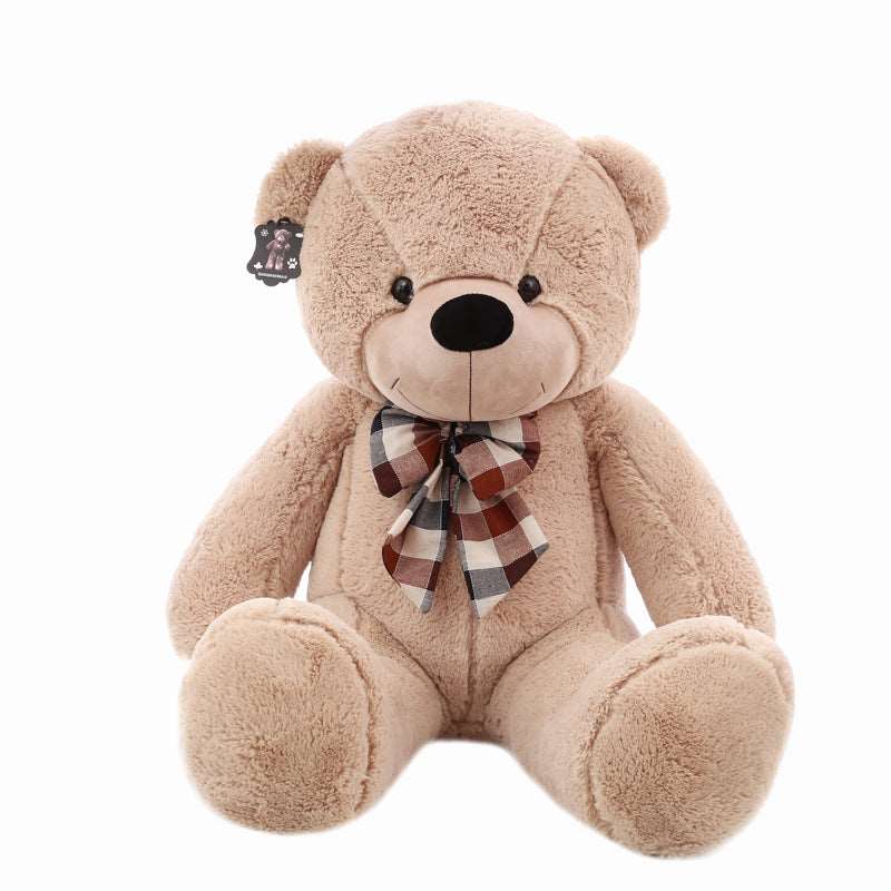 large teddy bear with bow tie