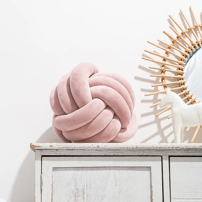 Leather Pink knot cushion