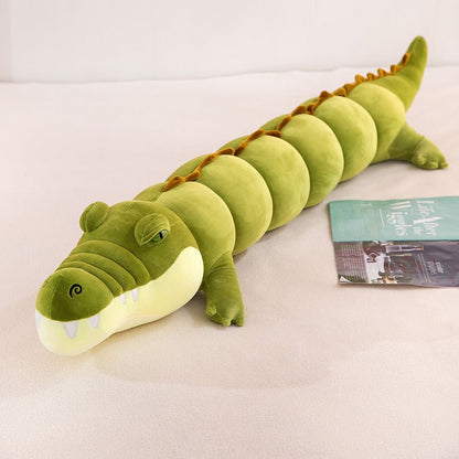 Long crocodile plush pillow displayed for a bed or sofa