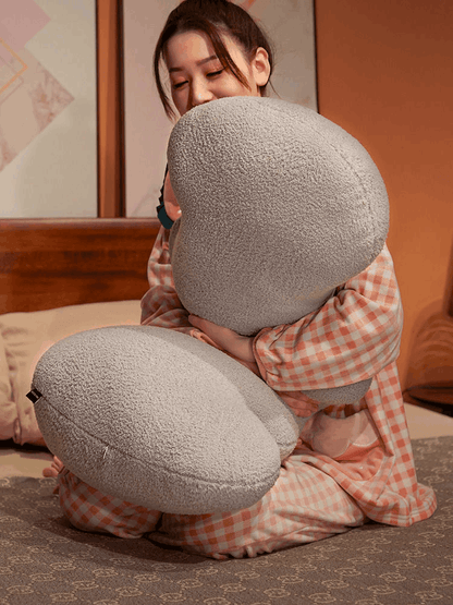 Long wave cushion styled on a sofa or bed