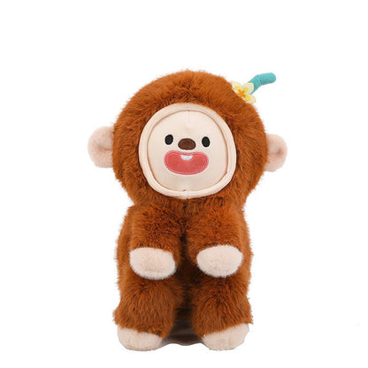Monkey plush toy showing changeable face feature