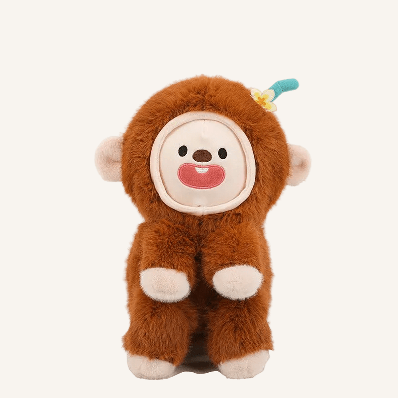 Brown monkey plush toy with changeable face