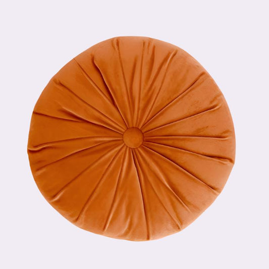 Orange round button cushion with pleated design