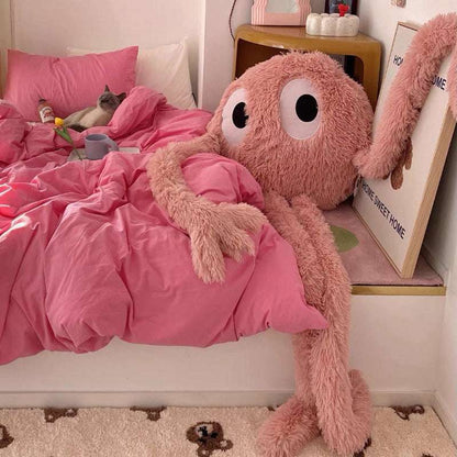 Oversized octopus plush cuddle pillow