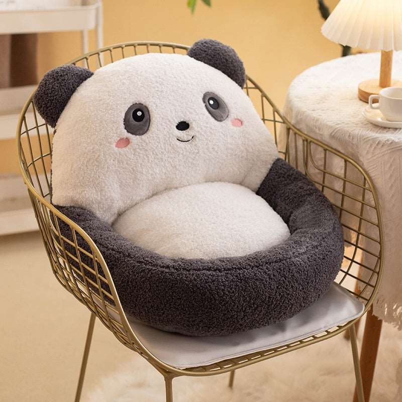 Panda plush seat cushion on sofa