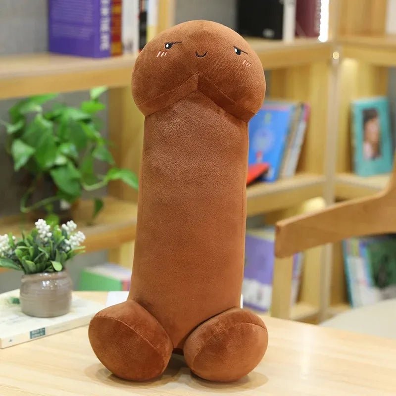 Penis plush toy with a playful cartoon face