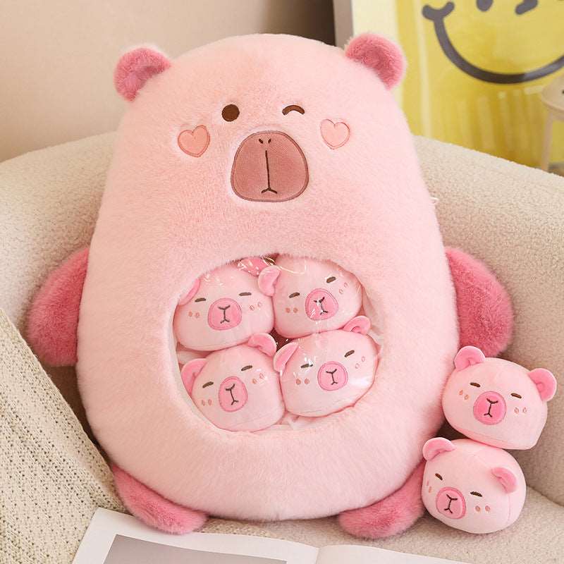 Pink capybara plushie bag with mini capybara toys