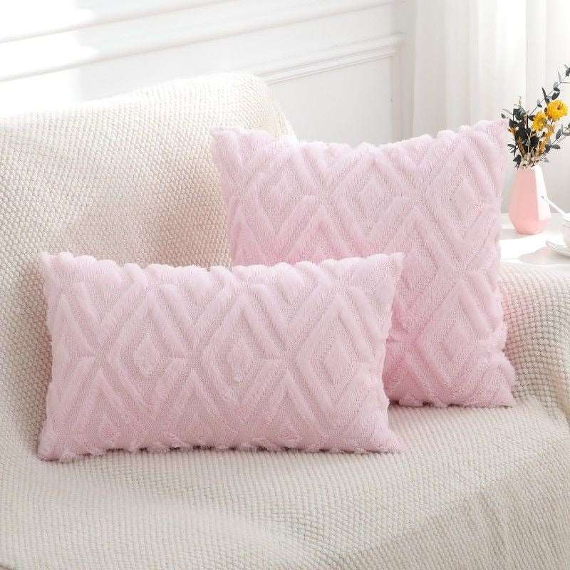 Pink rhombus textured cushion