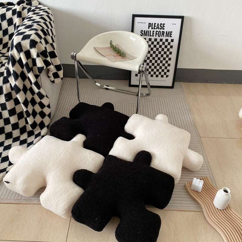 Puzzle piece cushion displayed as a decorative accent