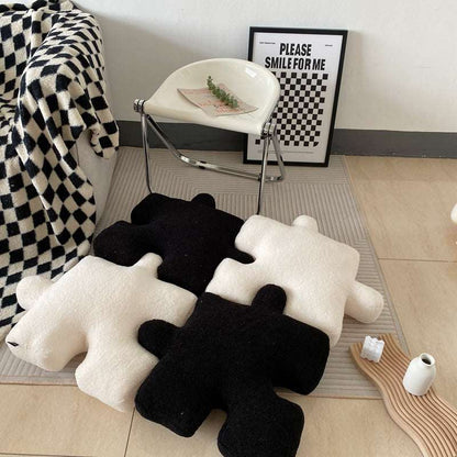 Puzzle piece cushion displayed as a decorative accent