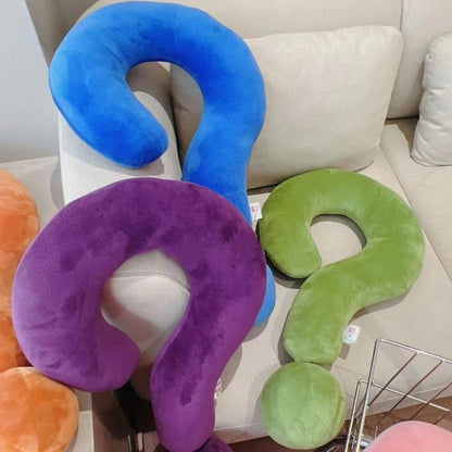 Question mark neck pillow for travel or lounging