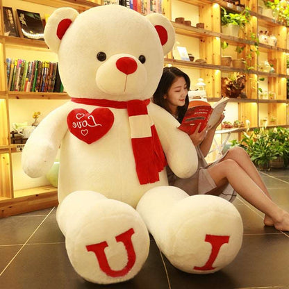 Red oversized teddy bear plush toy