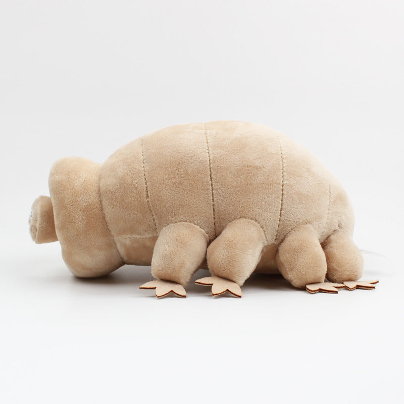 Plush toy resembling a tardigrade on a white background