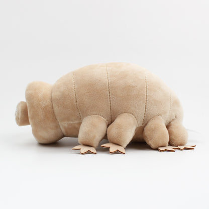 Plush toy resembling a tardigrade on a white background