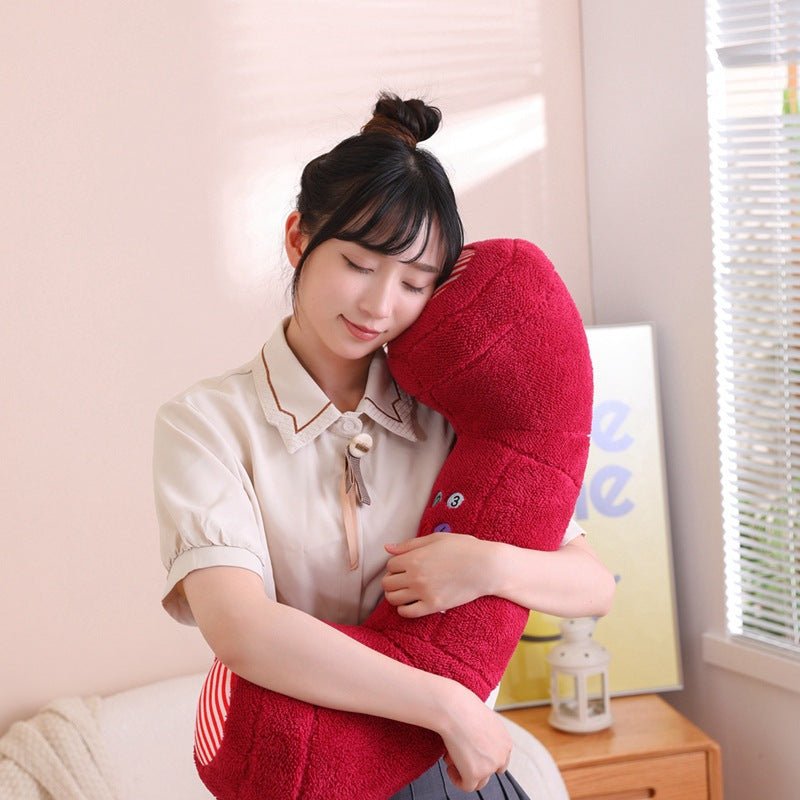 Telephone handset-shaped plush cushion