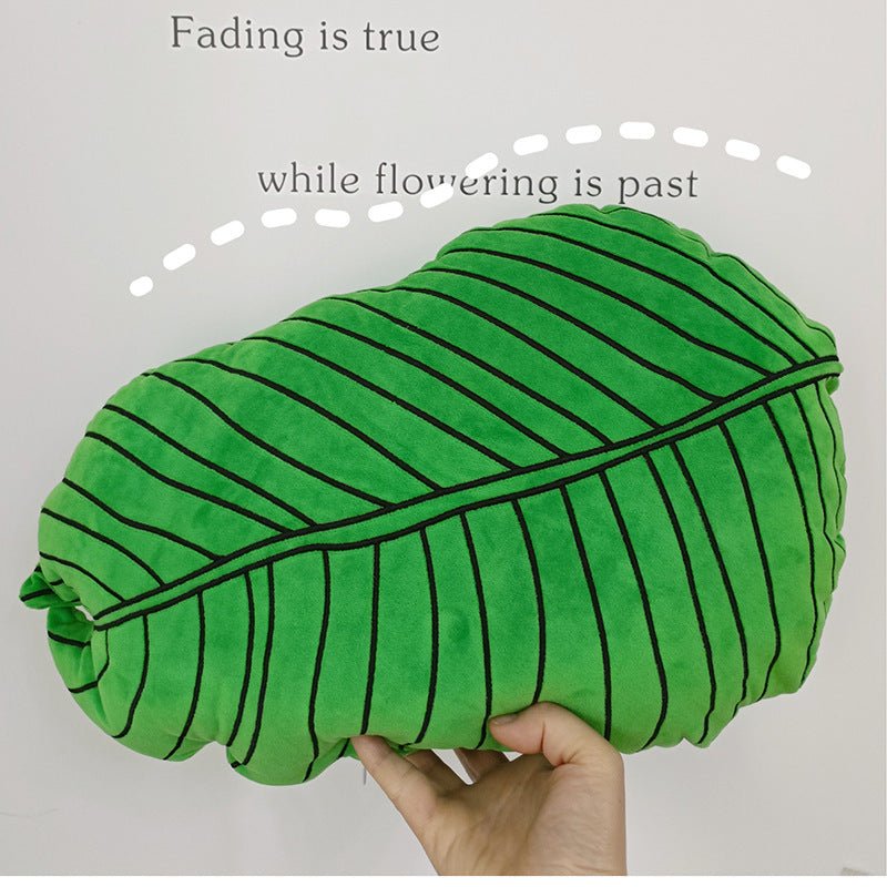 Tropical plant leaf throw pillow Design M