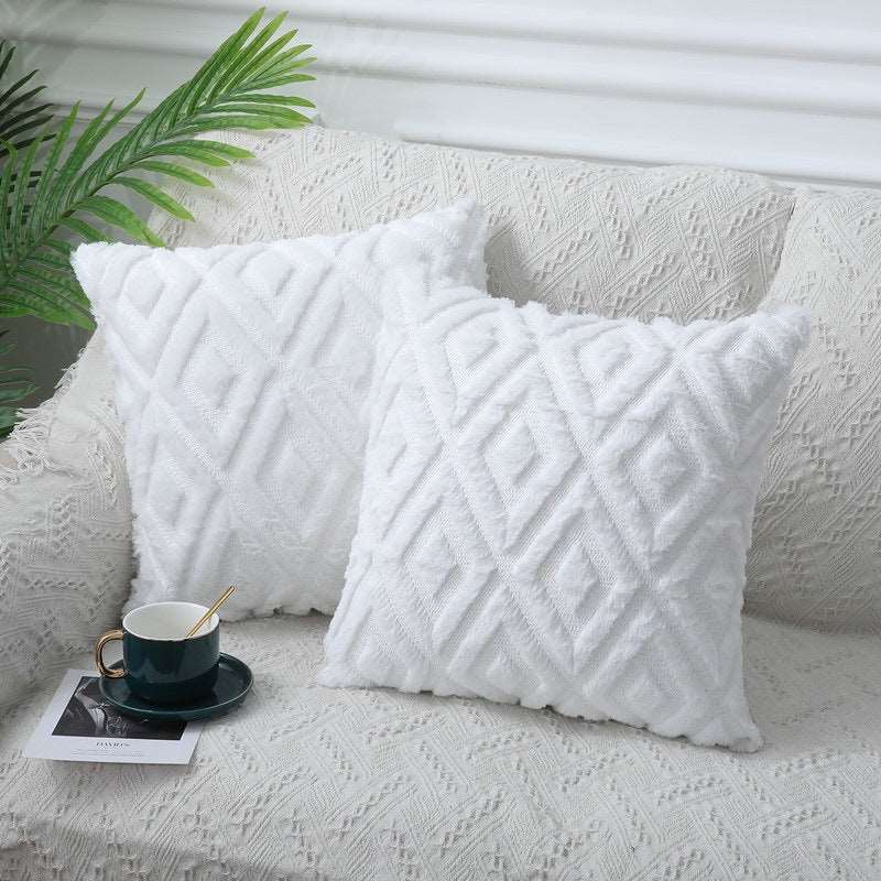 White rhombus textured cushion
