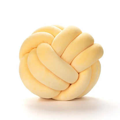 Yellow knot cushion